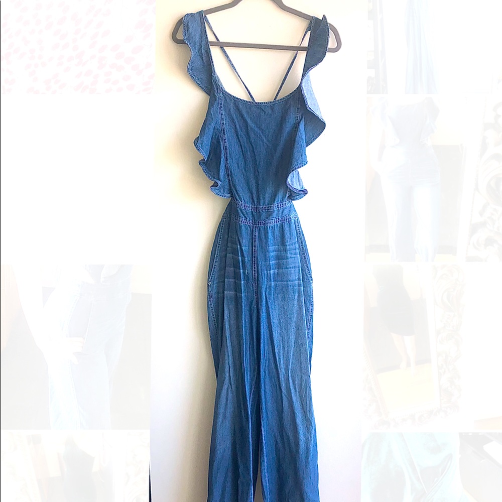 Never been worn denim jumpsuit with ruffle details